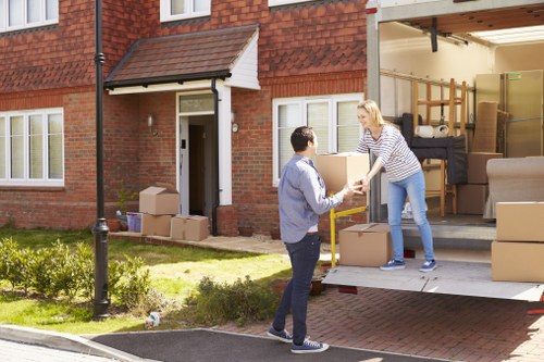 Packing and loading items into a moving truck in Totteridge