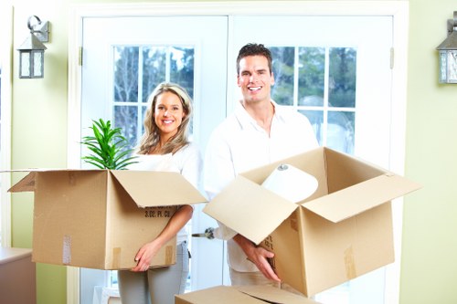 Packed boxes and furniture ready for transport in a local removals van