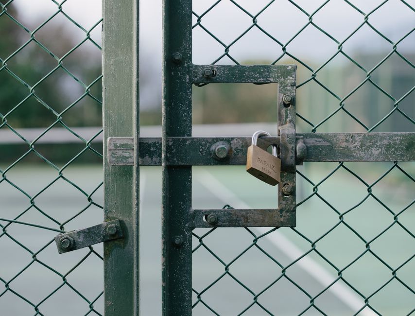A dark, industrial-style door marked with the number 331 in large, faded beige paint, featuring a metal handle and a chain securing a rectangular red and white sign that reads 'RESTRICTED AREA. DO NOT ENTER. AUTHORIZED PERSONNEL ONLY.' The door surface shows signs of wear, with visible scratches and peeling paint. The scene suggests a secure or private zone, possibly within a building or facility. This image relates to house removals and moving services by illustrating controlled access areas that may be encountered during logistical operations by companies such as Man with Van Totteridge, who specialise in professional home relocation, furniture transport, and packing and moving processes.
